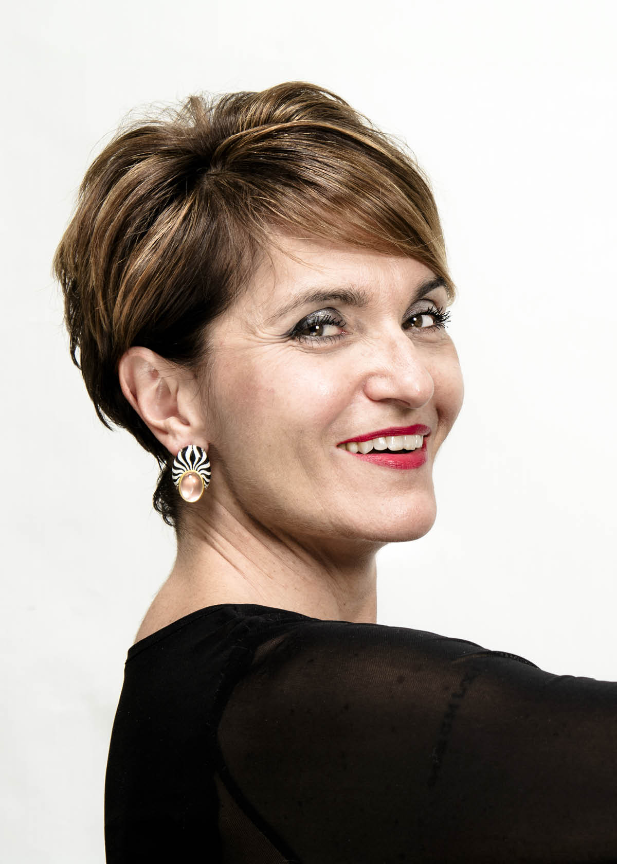 model wearing black and white earrings from italy contemporary jewelry bodyfurnitures